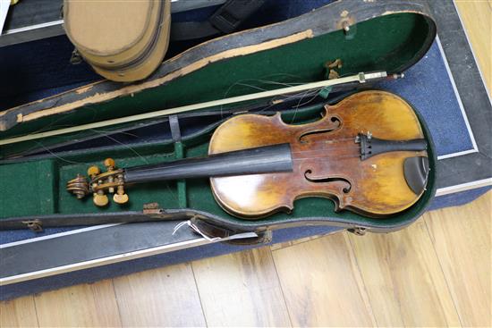 A full sized cased violin with bow